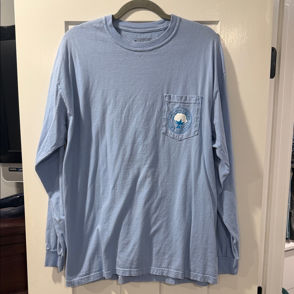 The Southern Shirt Company Light Blue Long Sleeve Pocket Tee with Chest Emblem